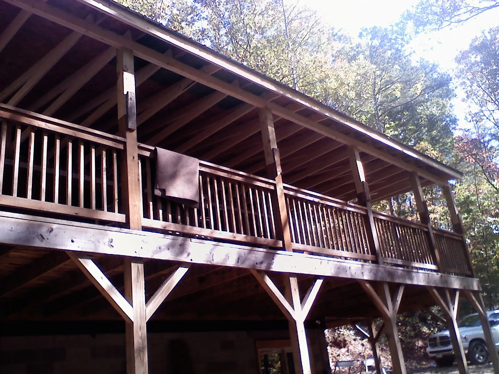 Timber framing under a new elevated porch and deck — Roof Leak Repair in Jericho by Roofing Brothers
